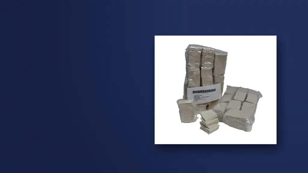 Bagged and loose cotton flannel cleaning swabs with a barcoded shipping label