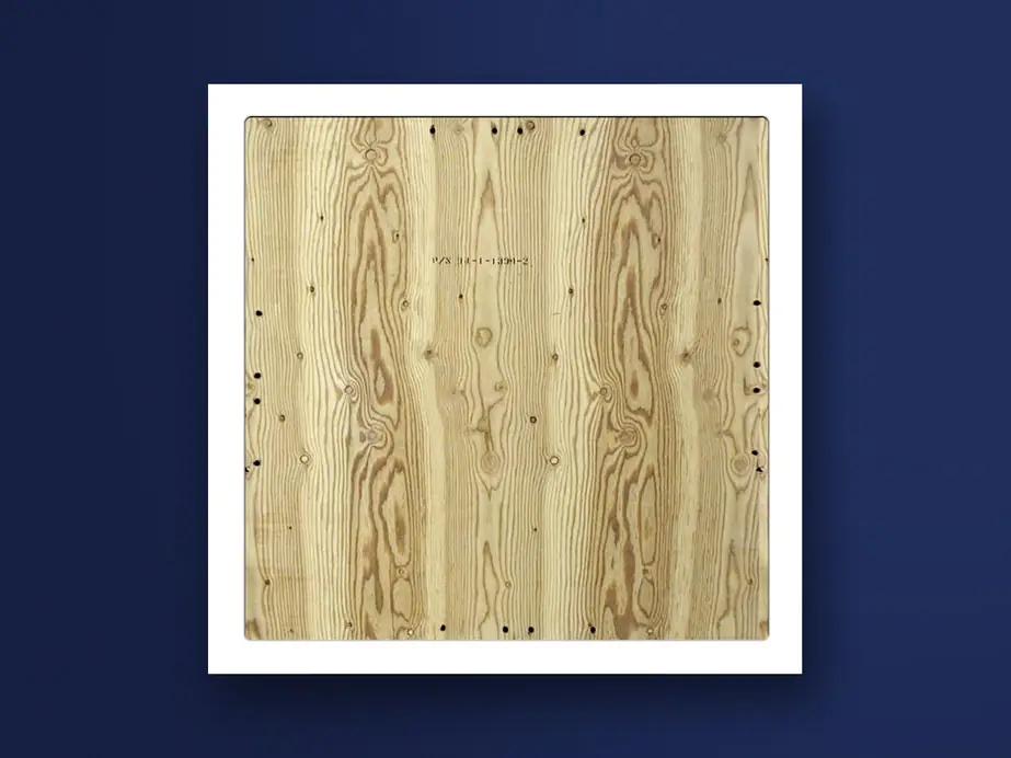 A square plywood skid board seen from above, grain running top to bottom