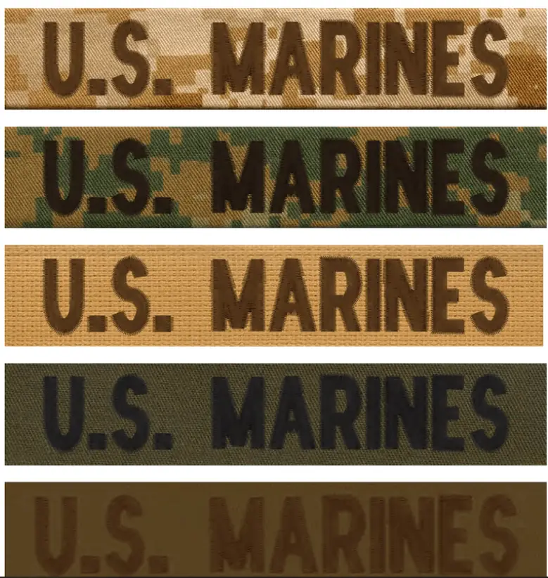 Five embroidered U.S. Marines tapes in MARPAT and solid colorways